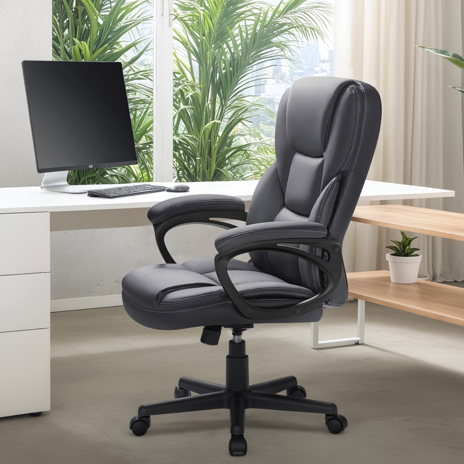 on Ergonomic Executive Office Chairs Featuring a High Back, Adjustable Height, Leather Upholstery, a Comfortable Headrest, Thick Cushioned Armrests, And Lumbar Support. Ideal for Both Home And Office Use